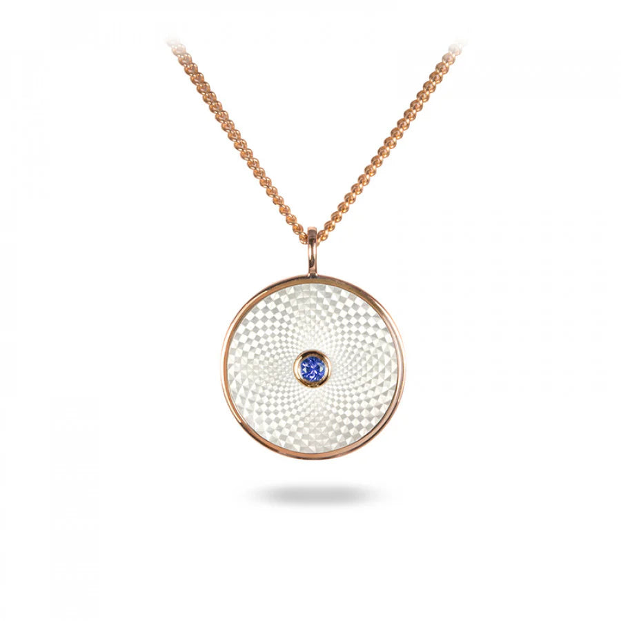 Sterling Silver Small Pendant with White Mother of Pearl and a Blue Sapphire Gem